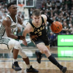 
              Purdue guard Braden Smith (3) drives as Michigan State guard Tyson Walker (2) defends during the first half of an NCAA college basketball game, Monday, Jan. 16, 2023, in East Lansing, Mich. (AP Photo/Carlos Osorio)
            