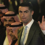 
              Cristiano Ronaldo attends the official unveiling as a new member of Al Nassr soccer club in in Riyadh, Saudi Arabia, Tuesday, Jan. 3, 2023. Ronaldo, who has won five Ballon d'Ors awards for the best soccer player in the world and five Champions League titles, will play outside of Europe for the first time in his storied career. (AP Photo/Amr Nabil)
            