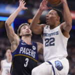 
              Memphis Grizzlies guard Desmond Bane (22) shoots over Indiana Pacers guard Chris Duarte (3) during the first half of an NBA basketball game in Indianapolis, Saturday, Jan. 14, 2023. (AP Photo/AJ Mast)
            