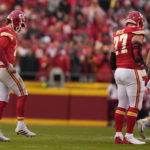 
              Kansas City Chiefs quarterback Patrick Mahomes (15) limps back to the huddle against the Jacksonville Jaguars during the first half of an NFL divisional round playoff football game, Saturday, Jan. 21, 2023, in Kansas City, Mo. (AP Photo/Jeff Roberson)
            