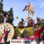 
              The Trader Joe's float rolls on at the 134th Rose Parade in Pasadena, Calif., Monday, Jan. 2, 2023. (AP Photo/Michael Owen Baker)
            