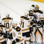 
              Boston Bruins' Jeremy Swayman (1) celebrates with teammates after an NHL hockey game against the New York Rangers Thursday, Jan. 19, 2023, in New York. The Bruins won 3-1. (AP Photo/Frank Franklin II)
            