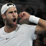 
              Karen Khachanov of Russia reacts during his third round match against Frances Tiafoe of the U.S. at the Australian Open tennis championship in Melbourne, Australia, Friday, Jan. 20, 2023. (AP Photo/Ng Han Guan)
            