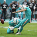 
              Miami Dolphins place kicker Jason Sanders (7) kicks a field goal as punter Thomas Morstead (4)holds, during the first half of an NFL football game against the New York Jets129, Sunday, Jan. 8, 2023, in Miami Gardens, Fla. (AP Photo/Lynne Sladky)
            
