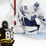 
              Boston Bruins' David Pastrnak (88) scores on Toronto Maple Leafs' Matt Murray (30) during the second period of an NHL hockey game Saturday, Jan. 14 2023, in Boston. (AP Photo/Michael Dwyer)
            