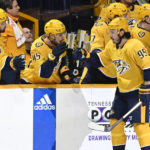 
              Nashville Predators center Matt Duchene (95) is congratulated after his goal against the Los Angeles Kings during the first period of an NHL hockey game Saturday, Jan. 21, 2023, in Nashville, Tenn. (AP Photo/Mark Zaleski)
            