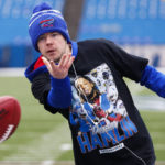 
              Buffalo Bills place kicker Tyler Bass wears a shirt in support of safety Damar Hamlin during practice before an NFL football game against the New England Patriots, Sunday, Jan. 8, 2023, in Orchard Park, N.Y. Hamlin remains hospitalized after suffering a catastrophic on-field collapse in the team's previous game against the Cincinnati Bengals. (AP Photo/Jeffrey T. Barnes)
            
