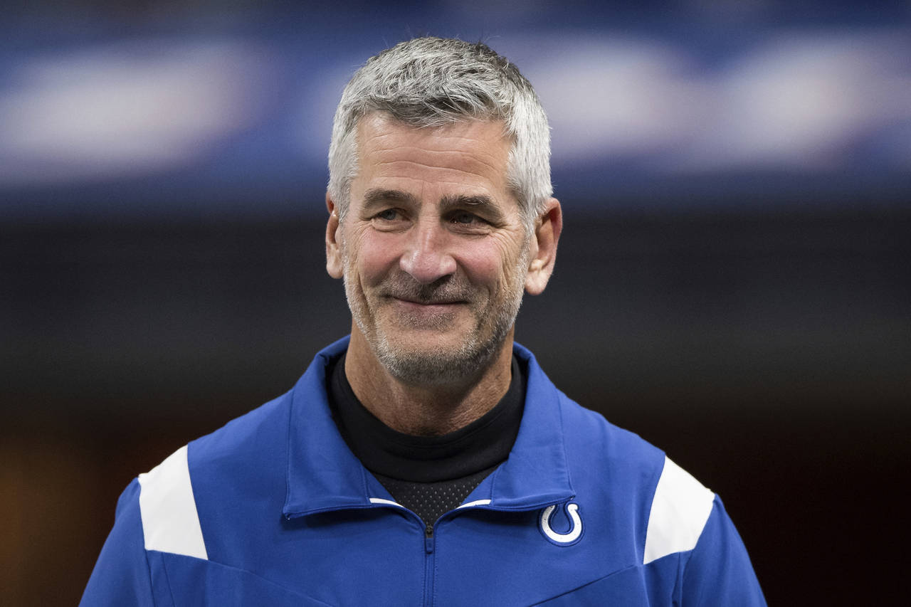 FILE - Indianapolis Colts head coach Frank Reich walks onto the field before an NFL football game a...