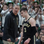 
              Purdue head coach Matt Painter talks to guard Braden Smith (3) during the second half of an NCAA college basketball game against Michigan State, Monday, Jan. 16, 2023, in East Lansing, Mich. (AP Photo/Carlos Osorio)
            
