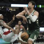 
              Washington Wizards' Bradley Beal knocks the ball from Milwaukee Bucks' Brook Lopez during the first half of an NBA basketball game Tuesday, Jan. 3, 2023, in Milwaukee. (AP Photo/Morry Gash)
            