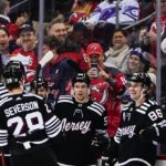 
              New Jersey Devils' Jack Hughes (86) celebrates with teammates after scoring a goal against the St. Louis Blues during the second period of an NHL hockey game Thursday, Jan. 5, 2023, in Newark, N.J. (AP Photo/Frank Franklin II)
            