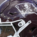 
              Mississippi State running back Jo'quavious Marks and the rest of the team wear stickers on their helmets in honor of former coach Mike Leach during the first half of the ReliaQuest Bowl NCAA college football game against Illinois Monday, Jan. 2, 2023, in Tampa, Fla. Leach passed away Dec. 13, 2022, from a heart condition. (AP Photo/Chris O'Meara)
            