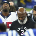 
              Houston Texans head coach Lovie Smith observes a moment of silence with Texans and Indianapolis Colts players before their NFL football game in support of Buffalo Bills safety Damar Hamlin, Sunday, Jan. 8, 2023, in Indianapolis. (AP Photo/Darron Cummings)
            