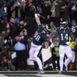 
              Philadelphia Eagles tight end Dallas Goedert (88) celebrates his touchdown catch as teammate Kenneth Gainwell (14) looks on during the first half of an NFL divisional round playoff football game against the New York Giants, Saturday, Jan. 21, 2023, in Philadelphia. (AP Photo/Matt Slocum)
            