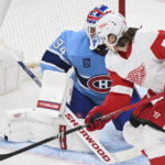 
              Detroit Red Wings' Oskar Sundqvist (70) moves in against Montreal Canadiens goaltender Jake Allen during second-period NHL hockey game action in Montreal, Thursday, Jan. 26, 2023. (Graham Hughes/The Canadian Press via AP)
            