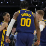 
              Golden State Warriors guard Jordan Poole, left, celebrates with Donte DiVincenzo, right, after scoring the game-winning basket against the Memphis Grizzlies during the second half of an NBA basketball game in San Francisco, Wednesday, Jan. 25, 2023. (AP Photo/Godofredo A. Vásquez)
            