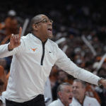 
              Texas interim coach Rodney Terry signals to players during the first half of the team's NCAA college basketball game against Oklahoma State in Austin, Texas, Tuesday, Jan. 24, 2023. (AP Photo/Eric Gay)
            