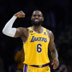
              Los Angeles Lakers' LeBron James (6) flexes his arm during the second half of an NBA basketball game against the Houston Rockets Monday, Jan. 16, 2023, in Los Angeles. The Lakers won 140-132. (AP Photo/Jae C. Hong)
            