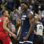 
              Minnesota Timberwolves guard Anthony Edwards (1) celebrates during the final seconds of the second half to secure the 128-126 win against the Toronto Raptors of an NBA basketball game Thursday, Jan. 19, 2023, in Minneapolis. (AP Photo/Abbie Parr)
            