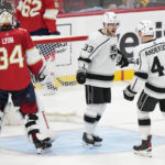 
              Los Angeles Kings right wing Viktor Arvidsson (33) celebrates with defenseman Mikey Anderson (44) after Arvidsson scored against Florida Panthers goaltender Alex Lyon (34) during the second period of an NHL hockey game, Friday, Jan. 27, 2023, in Sunrise, Fla. (AP Photo/Wilfredo Lee)
            