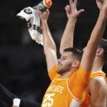 
              Tennessee guard Santiago Vescovi celebrates after a basket during the second half of an NCAA college basketball game against South Carolina, Saturday, Jan. 7, 2023, in Columbia, S.C. (AP Photo/Sean Rayford)
            