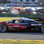 
              The Wheelen Engineering Racing Cadillac V-LMDh heads out of a turn through the infield course during a practice session for the Rolex 24 hour auto race at Daytona International Speedway, Thursday, Jan. 26, 2023, in Daytona Beach, Fla. (AP Photo/John Raoux)
            