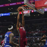 
              Miami Heat center Orlando Robinson (25) slam-dunks during the first half of an NBA basketball game against Los Angeles Clippers, Monday, Jan. 2, 2023, in Los Angeles. (AP Photo/Allison Dinner)
            
