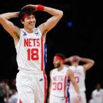 
              Brooklyn Nets' Yuta Watanabe (18), of Japan, celebrates with teammates after a dunk by Kyrie Irving during the first half of an NBA basketball game against the San Antonio Spurs, Monday, Jan. 2, 2023, in New York. (AP Photo/Frank Franklin II)
            