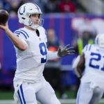 
              Indianapolis Colts' Nick Foles (9) throws a pass during the first half of an NFL football game against the New York Giants, Sunday, Jan. 1, 2023, in East Rutherford, N.J. (AP Photo/Seth Wenig)
            