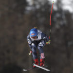 
              United States' Mikaela Shiffrin is airborne as she speeds down the course during an alpine ski, women's World Cup downhill race, in Cortina d'Ampezzo, Italy, Saturday, Jan. 21, 2023. (AP Photo/Gabriele Facciotti)
            