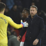 
              Chelsea's head coach Graham Potter greets Chelsea's goalkeeper Kepa Arrizabalaga after the English Premier League soccer match between Nottingham Forest and Chelsea at City ground in Nottingham, England, Sunday, Jan. 1, 2023. (AP Photo/Rui Vieira)
            