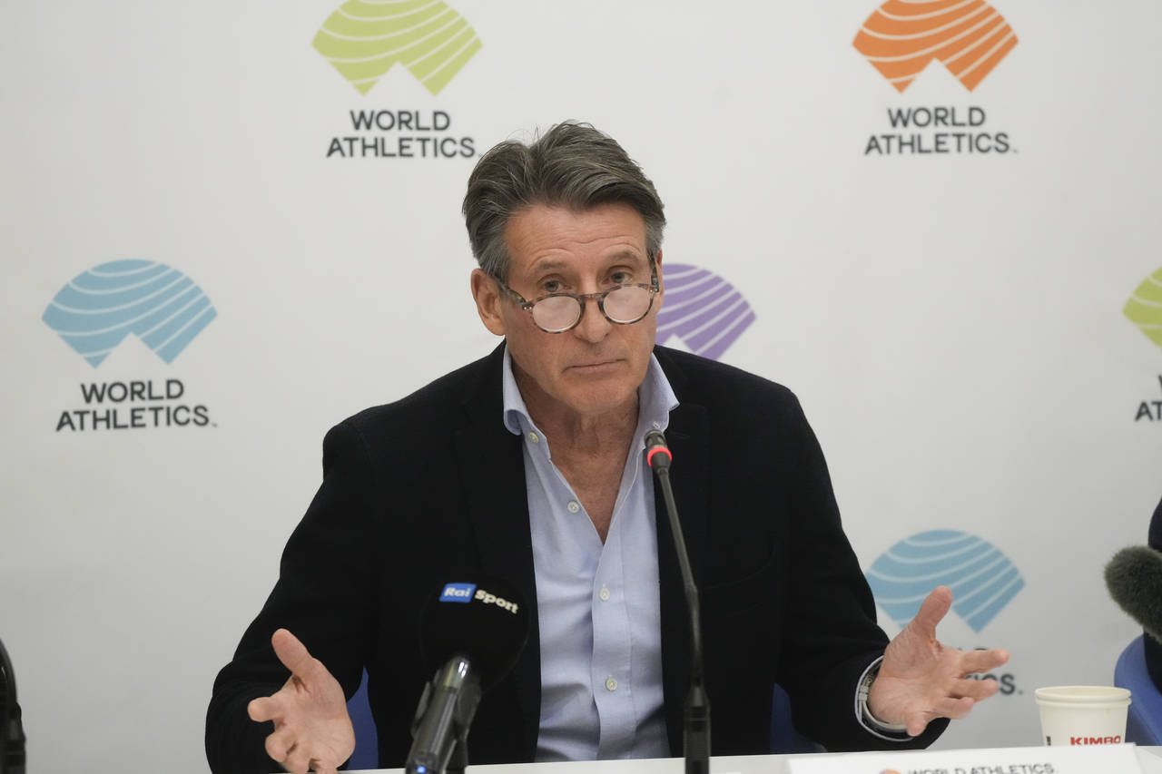 FILE - World Athletics President Sebastian Coe holds a press conference at the conclusion of the Wo...