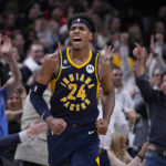 
              Indiana Pacers guard Buddy Hield (24) reacts as the Pacers took the lead against the Chicago Bulls during the second half of an NBA basketball game in Indianapolis, Tuesday, Jan. 24, 2023. (AP Photo/Michael Conroy)
            