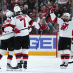 
              New Jersey Devils defenseman Dougie Hamilton (7) celebrates his goal against the Detroit Red Wings in the second period of an NHL hockey game Wednesday, Jan. 4, 2023, in Detroit. (AP Photo/Paul Sancya)
            