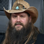 
              FILE - Chris Stapleton arrives at the 64th Annual Grammy Awards in Las Vegas on April 3, 2022. Stapleton will hit next month’s Super Bowl stage to sing the national anthem, while R&B legend Babyface will perform “America the Beautiful.”  (Photo by Jordan Strauss/Invision/AP, File)
            