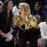 
              LSU head coach Kim Mulkey calls out rom the bench in the second half an NCAA college basketball game against Arkansas in Baton Rouge, La., Thursday, Jan. 19, 2023. LSU won 79-76. (AP Photo/Gerald Herbert)
            