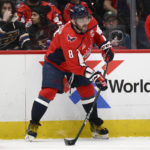 
              Washington Capitals left wing Alex Ovechkin (8) works with the puck during the second period of the team's NHL hockey game against the Pittsburgh Penguins, Thursday, Jan. 26, 2023, in Washington. (AP Photo/Nick Wass)
            