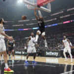 
              Houston Rockets forward Kenyon Martin Jr. (6) dunks against the Los Angeles Clippers during the first half of an NBA basketball game, Sunday, Jan. 15, 2023, in Los Angeles. (AP Photo/Marcio Jose Sanchez)
            