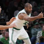 
              Boston Celtics center Al Horford, right, knocks the ball away from Chicago Bulls center Nikola Vucevic, left, during the second half of an NBA basketball game, Monday, Jan. 9, 2023, in Boston. (AP Photo/Charles Krupa)
            