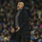 
              Manchester City's head coach Pep Guardiola reacts during the English FA Cup soccer match between Manchester City and Chelsea at the Etihad Stadium in Manchester, England, Sunday, Jan. 8, 2023. (AP Photo/Dave Thompson)
            