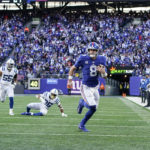 
              New York Giants' Daniel Jones (8) runs for a touchdown during the second half of an NFL football game against the Indianapolis Colts, Sunday, Jan. 1, 2023, in East Rutherford, N.J. (AP Photo/Bryan Woolston)
            