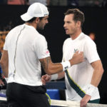 
              Andy Murray, right, of Britain is congratulated by Matteo Berrettini of Italy following their first round match at the Australian Open tennis championship in Melbourne, Australia, Tuesday, Jan. 17, 2023. (AP Photo/Aaron Favila)
            