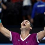 
              FILE - Rafael Nadal, of Spain, celebrates his win over Daniil Medvedev, of Russia, in the men's singles final at the Australian Open tennis championships in Melbourne, Australia, Jan. 31, 2022. Nadal is the defending men's champion at Melbourne Park and owner of a men's-record 22 major championships.(AP Photo/Hamish Blair, File)
            