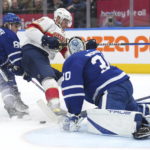 
              Toronto Maple Leafs goaltender Matt Murray (30) makes a save on Florida Panthers forward Aleksander Barkov (16) as Maple Leafs forward William Nylander (88) defends during the first period of an NHL hockey game Tuesday, Jan. 17, 2023, in Toronto. (Nathan Denette/The Canadian Press via AP)
            