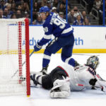 
              Tampa Bay Lightning center Vladislav Namestnikov (90) watches his shot get past Columbus Blue Jackets goaltender Elvis Merzlikins for a goal during the second period of an NHL hockey game Tuesday, Jan. 10, 2023, in Tampa, Fla. (AP Photo/Chris O'Meara)
            