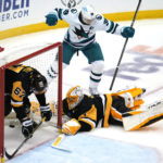 
              San Jose Sharks' Logan Couture (39) celebrates his goal against Pittsburgh Penguins goaltender Casey DeSmith (1) with Rickard Rakell (67) defending during the third period of an NHL hockey game in Pittsburgh, Saturday, Jan. 28, 2023. The Sharks won 6-4. (AP Photo/Gene J. Puskar)
            