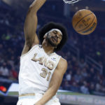 
              Cleveland Cavaliers center Jarrett Allen dunks against the Miami Heat during the first half of an NBA basketball game, Tuesday, Jan. 31, 2023, in Cleveland. (AP Photo/Ron Schwane)
            