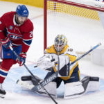 
              Nashville Predators goaltender Yaroslav Askarov makes a save as Montreal Canadiens' Jonathan Drouin looks for the rebound during second-period NHL hockey game action in Montreal, Thursday, Jan. 12, 2023. (Paul Chiasson/The Canadian Press via AP)
            