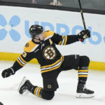 
              Boston Bruins defenseman Charlie McAvoy celebrates after scoring in the second period of an NHL hockey game against the San Jose Sharks, Sunday, Jan. 22, 2023, in Boston. (AP Photo/Steven Senne)
            