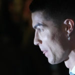 
              Cristiano Ronaldo wears an earring with a cross as he attends the official unveiling as a new member of Al Nassr soccer club in in Riyadh, Saudi Arabia, Tuesday, Jan. 3, 2023. Ronaldo, who has won five Ballon d'Ors awards for the best soccer player in the world and five Champions League titles, will play outside of Europe for the first time in his storied career. (AP Photo/Amr Nabil)
            